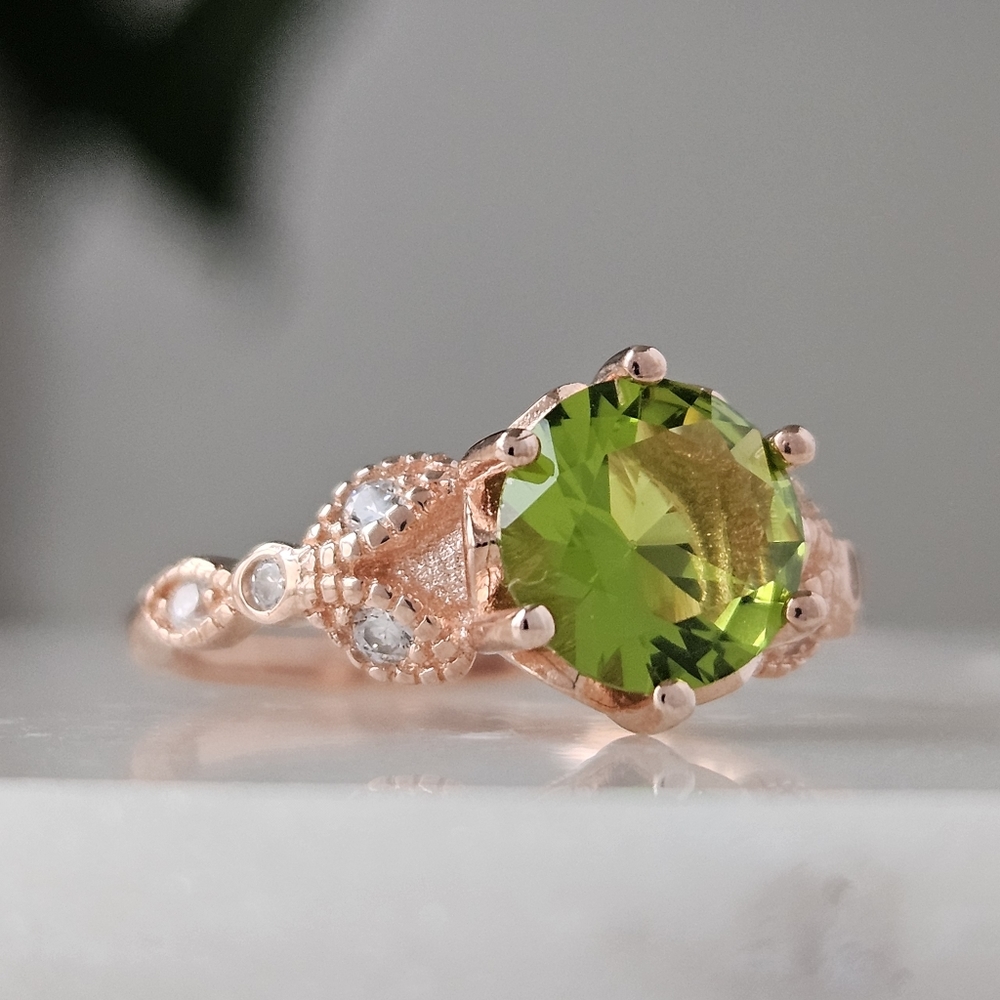 Charmed Aroma Rose Gold ring with green Peridot, size 7, 925 Sterling Silver